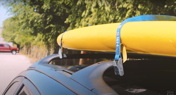 paddle board strapped to roof