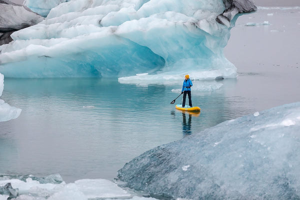 woman paddle boarding
