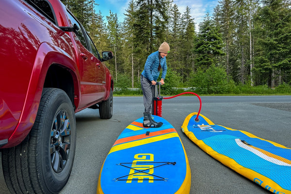 pumping up a paddle board