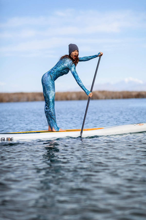 woman paddling paddle board