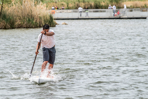paddling a paddle board
