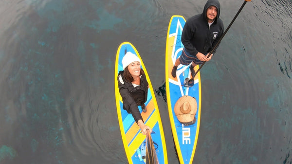 two people on paddle boards