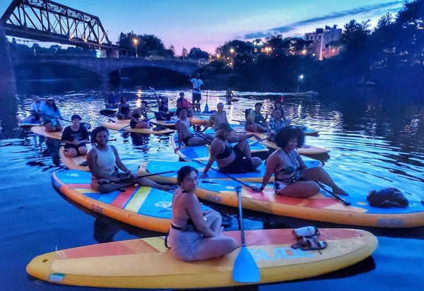 group on paddle boards