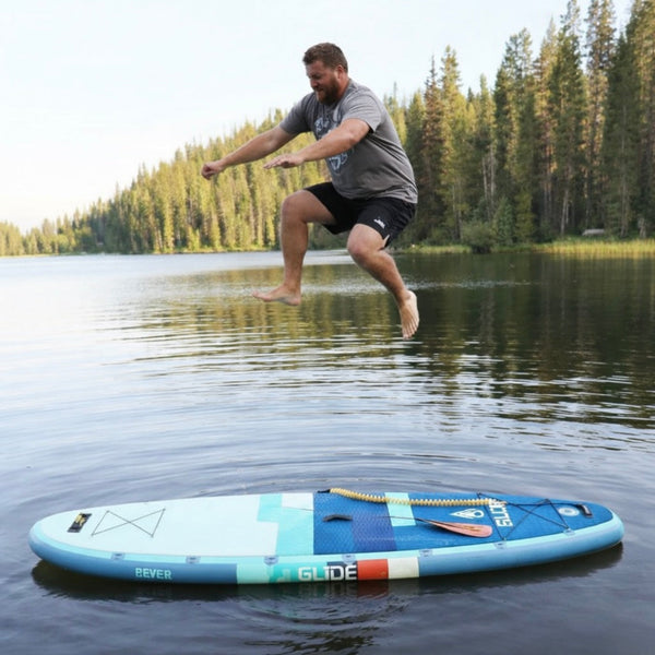 jumping on a paddle board