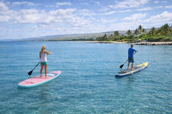 couple on paddle boards