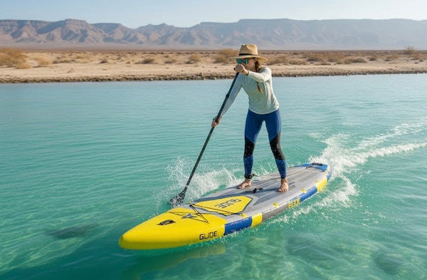 woman on stand up paddle board