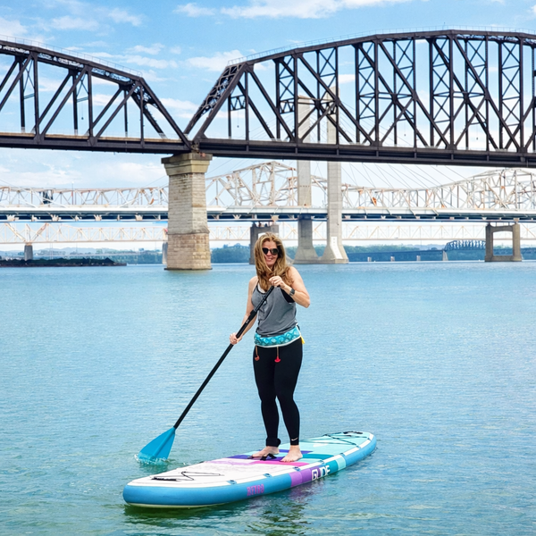 woman on inflatable paddle board