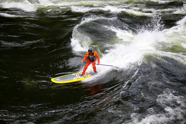 Demystifying the Adventure: River Surfing on a Paddle Board