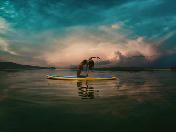 Mastering the Art of SUP Yoga: Tips and Tricks for Achieving Balance on Your Inflatable Paddle Board